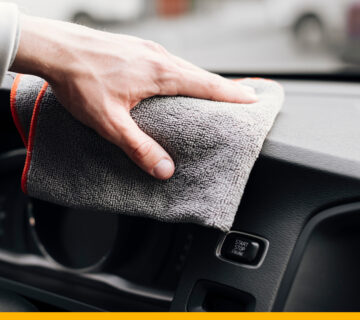 close-up-person-cleaning-car-interior